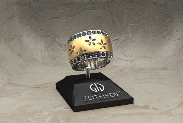 Bicolor-Ring aus Weiß- und Gelbgold mit schwarzen Diamanten
